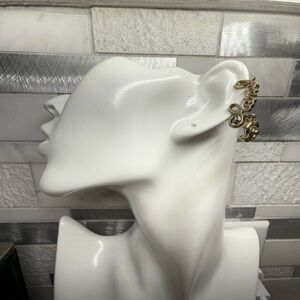 PrelovedCHANEL Cursive Gold Logo clip on Earrings